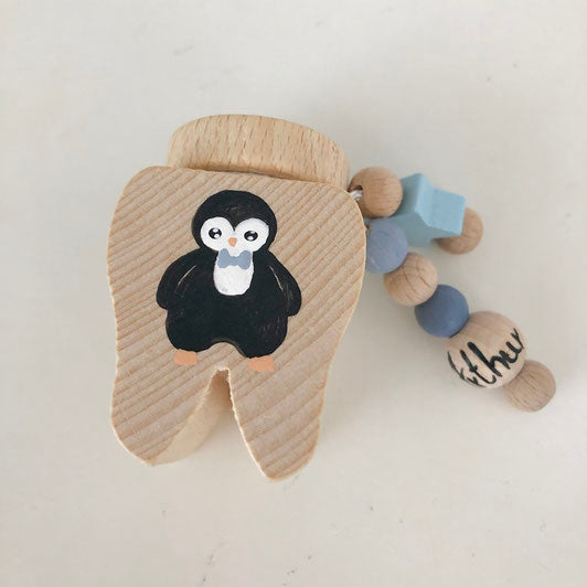 Tooth tin, curl tin penguin